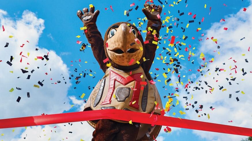 Image of Testudo jumping with confetti