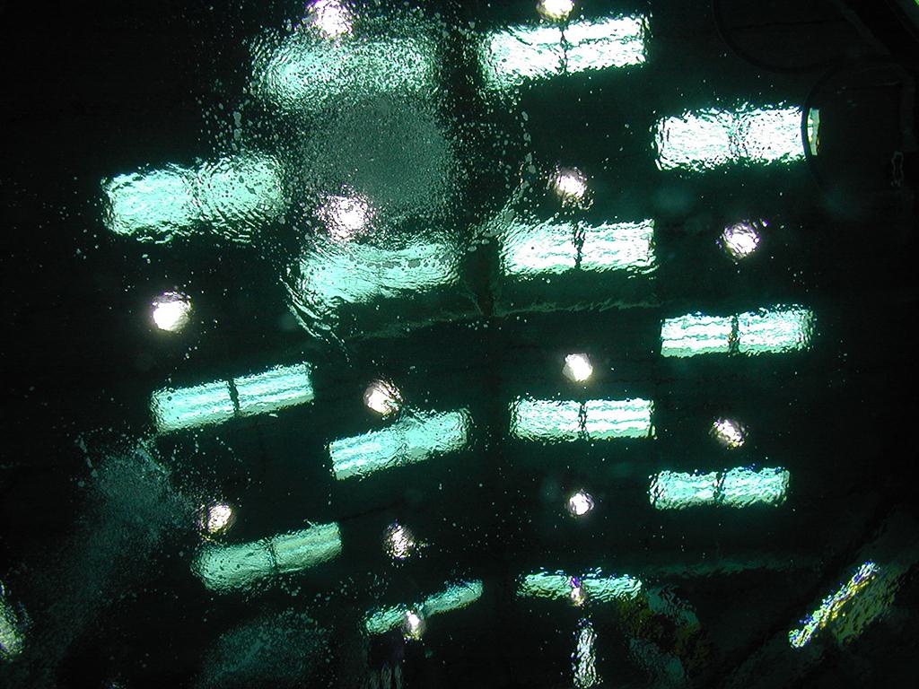 Underwater looking up at the ceiling above the Neutral Buoyancy tank