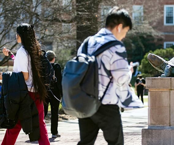 Student walking on campus