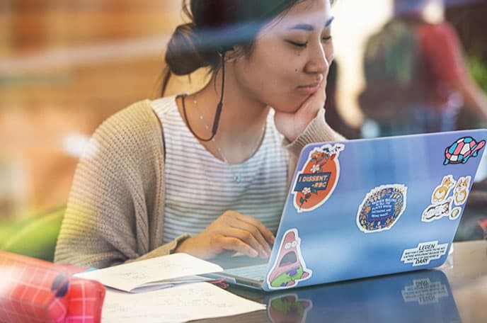 female student on laptop